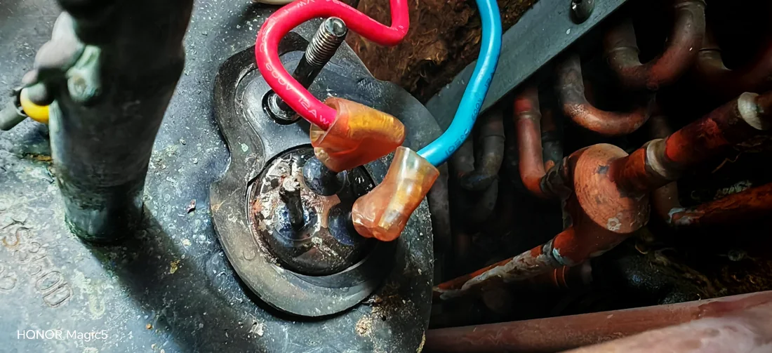 Air conditioning system component being repaired